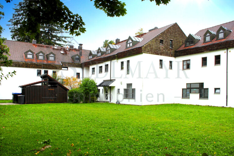 Außenansicht und Gemeinschaftsgarten